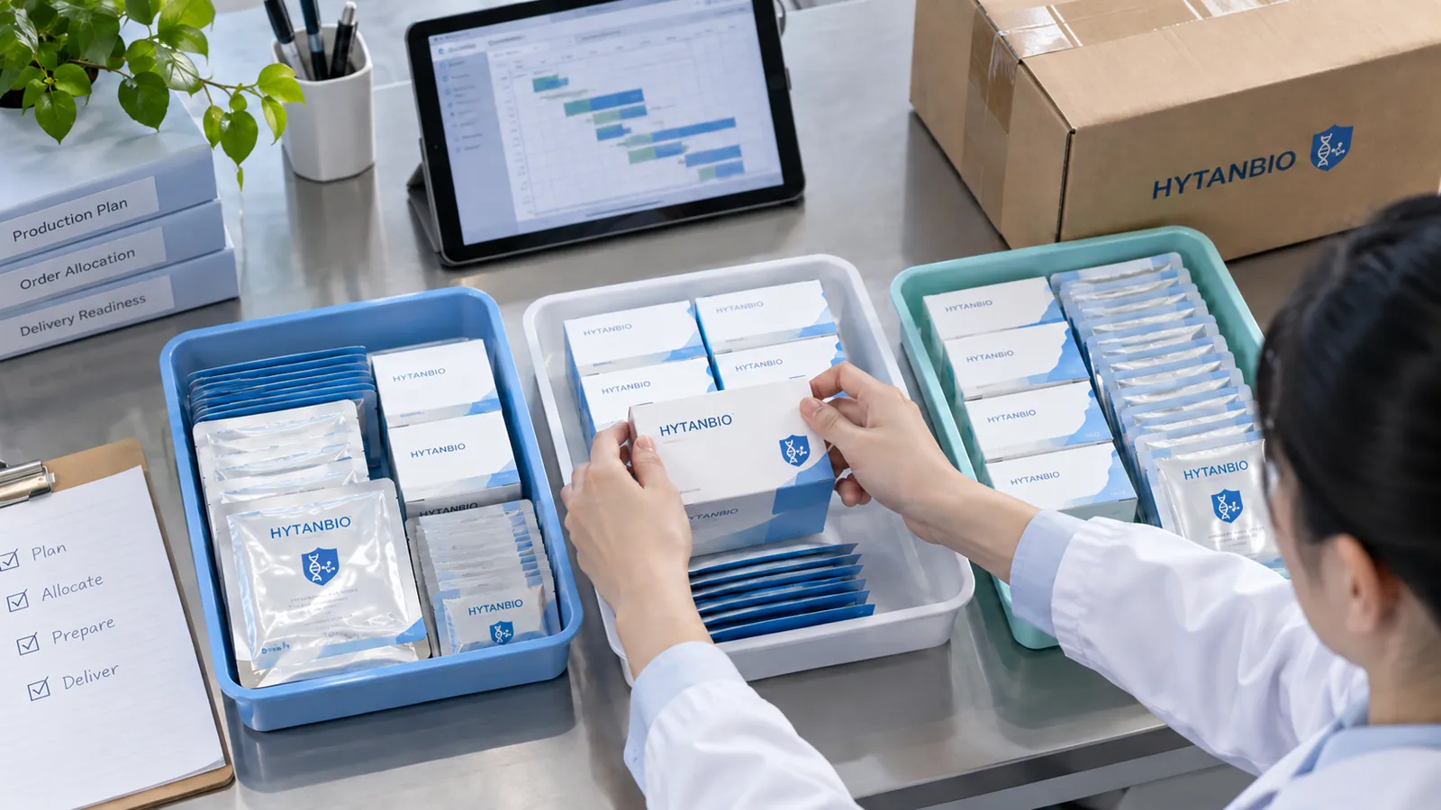 Production planner organizing HYTANBIO oral-film order trays for dispatch allocation